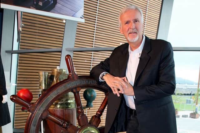 Titanic film director James Cameron with the ship's wheel from the movie, at the Titanic Belfast museum. A Â£14 million bid to buy a collection of more than 5,500 artefacts from the Titanic wreck site and bring them to Northern Ireland has been launched. Pic by Paul Faith/PA Wire