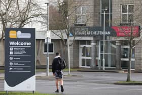 A man has been arrested on suspicion of terrorism offences after a woman was stabbed outside a leisure centre. The woman was attacked outside the centre in Cheltenham on Thursday night and was taken to hospital where she is now said to be in a stable condition. 