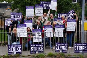 School support workers, cleaning staff and janitors are currently on strike in Scotland as the Unison union remains locked in a pay dispute with education chiefs. (Credit: Jane Barlow/PA Wire)