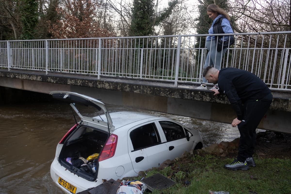 Watch: Man who saved woman and child trapped in sinking car acted 'on instinct'