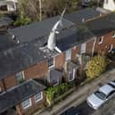 The owner of a world-famous house with a 25ft shark sticking out of the roof has been banned from renting it out on Airbnb Picture: Tom Wren / SWNS