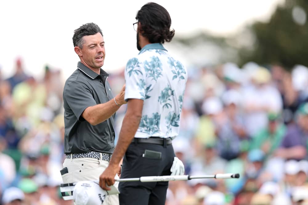 Northern Ireland's Rory McIlroy with Akshay Bhatia after the Masters second round
