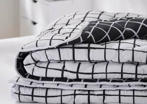 The duvet is machine washable, and warm enough for winter