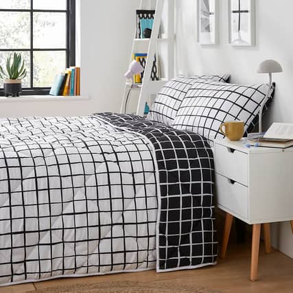 Dunelm's reversible duvet is such a simple solution for people who don't like fitting covers - and it's an absolute bargain right now