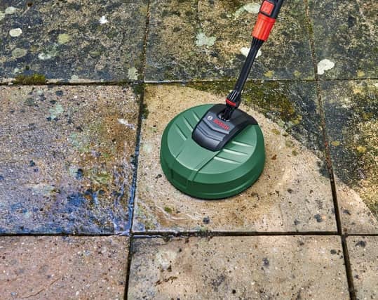 Algae builds up over damp winters - but there are some cheap tools to help you bring patios back from the brink