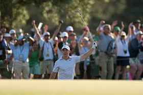 Rory McIlroy celebrates after chipping in at 17 on day two of The Masters
