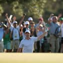 Rory McIlroy celebrates after chipping in at 17 on day two of The Masters
