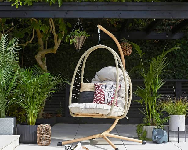 Sydney Rope Folding Egg Chair includes a plush cushion and can be folded to make seasonal storage more convenient