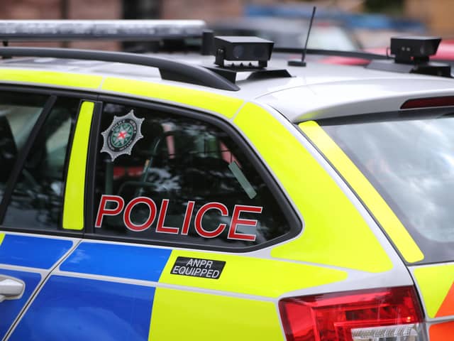   Two men have been arrested following the ramming of a police vehicle in west Belfast.  