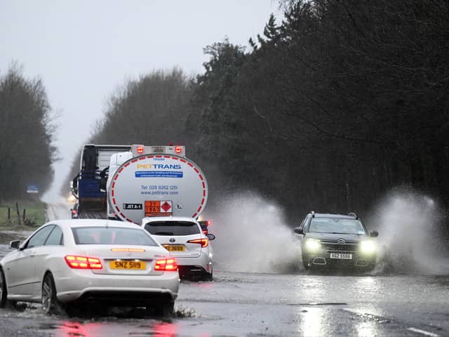 Motorists contend with heavy flooding near Belfast International Airport on 27 January 2026 in Antrim, Northern Ireland.