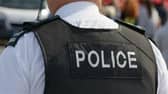   Items including stones and bottles were thrown at officers causing damage to two police vehicles.  