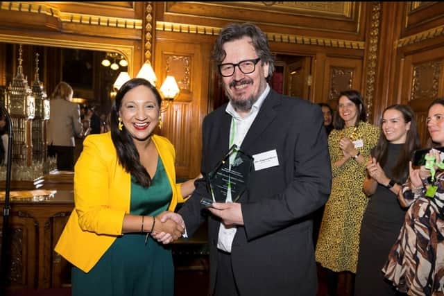Peter McCann from Strident Media receives the Best Broadcast Story on Human Trafficking at the 2026 Anti-Slavery Day Awards on behalf of documentary director Grace Sweeney, from Satvir Kaur MP (Minister for Safeguarding and Violence Against Women and Girl