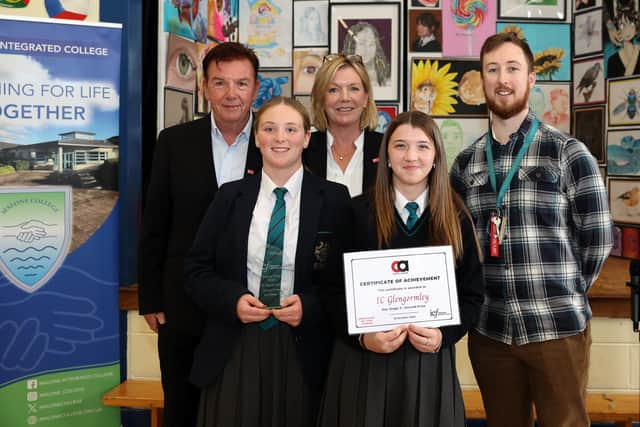 Tony and Edna Carson presenting the Carson Award to IC Glengormley students and teacher.