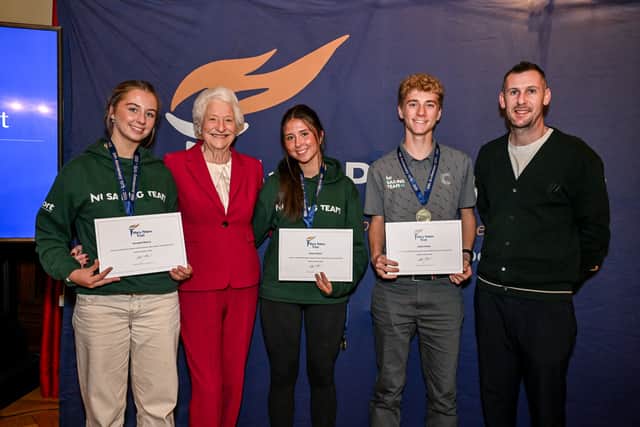 Lady Mary Peters and Michael McKillop pictured with sailing athletes funded by Mary Peters Trust