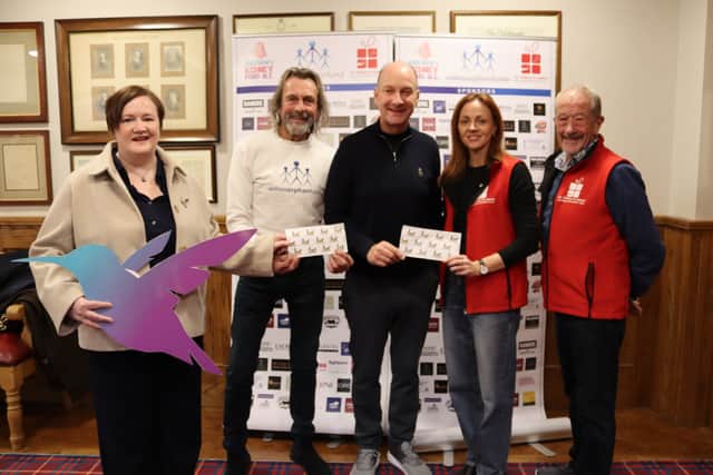 Willie Gregg pictured with representatives of the NI Children's Kidney Fund, NI Children to Lapland and Days to Remember Trust, and the Hummingbird Project following cheque presentations from funds raised through Wee Joan's Dog Walk.