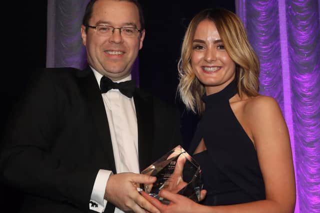 Seamus McGuckin AIB presents Noleen McGuckin with the Small Business of the Year Award