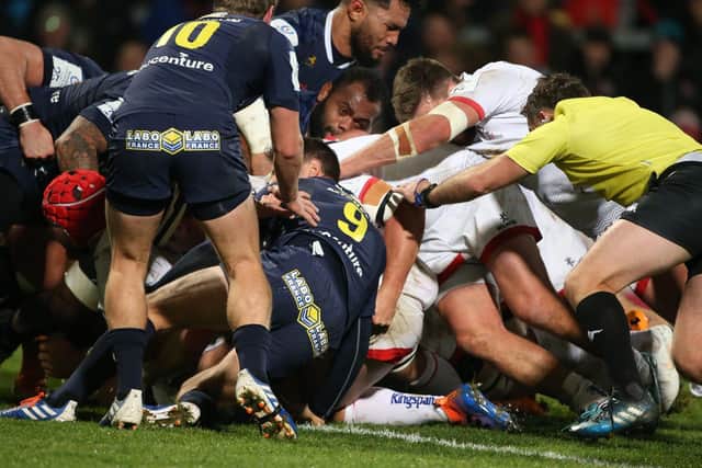 Jordi Murphy is driven over for an Ulster try against Clermont