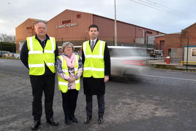 Highlighting the road safety problems for workers at golden Cow Dairies, Artabrackagh Road, are from left, Paddy McAlister, operations manager, Joy Mc Farland, health and safety manager, and local MLA, Jonny Buckley. INPT49-203.