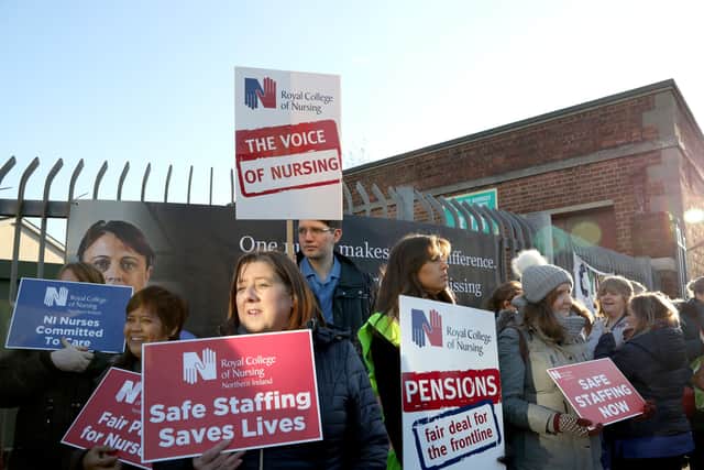 Nurses gathered at the gates of the Royal Victoria Hospital in Belfast as part of their industrial action in protest at pay and unsafe staffing levels