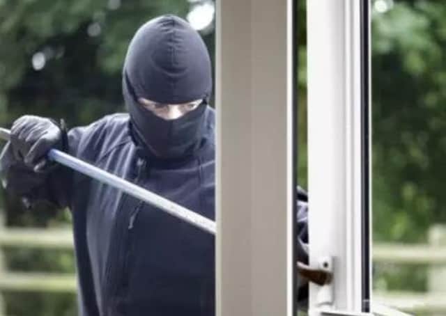 The gangs forced their way into the homes of two pensioners, said the PSNI