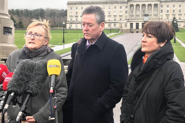 (left to right) Anne Speed of Unison, Kevin McAdam of Unite and Maria Morgan from Nipsa outside Stormont in Belfast, who will take part in talks with the Department of Health aimed at ending industrial action by health workers in an ongoing dispute over pay and staffing levels in the health service in Northern Ireland. Photo credit: Rebecca Black/PA Wire