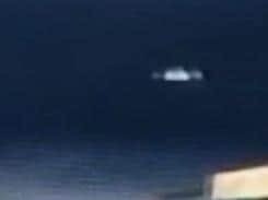 This a magnified view of the white object as it moves across the sky.