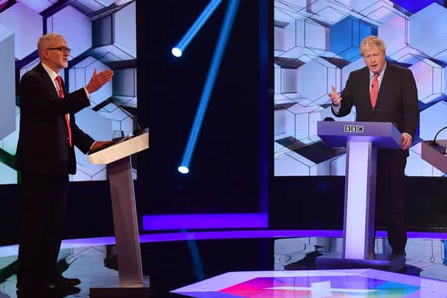 Jeremy Corbyn (left) and Boris Johnson during Friday night’s debate on the BBC