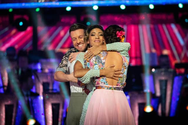 BBC handout photo of with Chris Ramsay and Karen Hauer being hugged by Karim Zeroual with Amy Dowden after the comedian became the latest celebrity to be voted off BBC1's Strictly Come Dancing