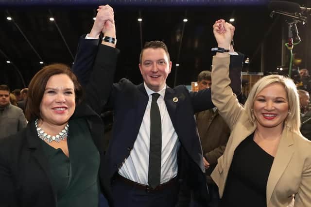 Sinn Fein's John Finucane celebrates with party leader Mary Lou McDonald (left) and deputy leader Michelle O'Neill after winning in the Belfast North constituency at the Titanic exhibition centre, Belfast, for the 2019 General Election. PA Photo