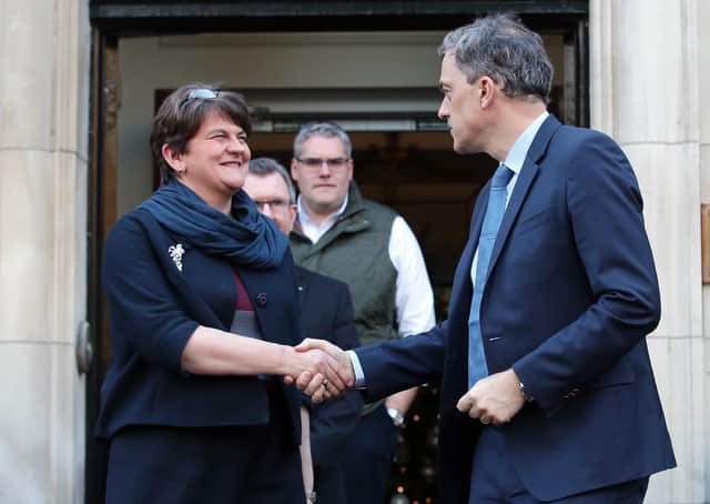 DUP leader Arlene Foster shakes hands with Northern Ireland Secretary Julian Smith at Stormont House