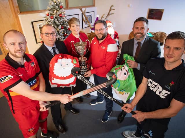 Millar McCall Wylie has announced a sponsorship deal with Ulster hockeys most prestigious male competition, the Kirk Cup. The team from Millar McCall Wylie visited NI Childrens Hospice this week to share Christmas gifts ahead of the competitive final on Boxing Day. Funds raised on Boxing Day will go towards supporting NI Childrens Hospice and this important service in Northern Ireland. Pictured is (L-R) Eugene Magee Captain of Banbridge, Christopher McCandless, Millar McCall Wylie, Sheila Duffy, NI Childrens Hospice nurse, Marc Scott, Ulster Hockey, Jan Cunningham, Millar McCall Wylie and Jonny Bell from Lisnagarvey.