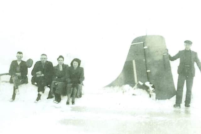 People made their way over to the plane on the frozen lough