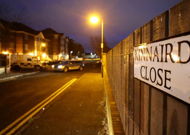 PSNI officers at the scene on Kinnaird Close in Belfast, after the bodies of a man and a woman were found in an apartment on Monday afternoon. PA Photo. Photo: Liam McBurney/PA Wire