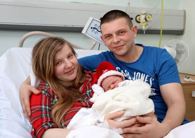 Mum Nicole Cochrane and dad Martin with newborn baby girl, Darcy. She was born by C-Section on Christmas Day in the RJMS at 03.36am, weighing 7lb 10oz (3470g). Photo Laura Davison/Pacemaker Press