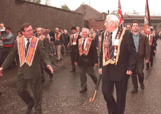 David Trimble (left) and Ian Paisley leading the parade in 1995 after a stand-off was followed by a decision to allow Orangemen along the Garvaghy Road