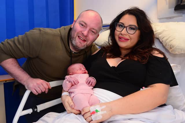 Keiva Troupe and Warren with their girl Pixie, born at 12.02am at the Ulster, 7lb 13oz, possibly the first baby born in Belfast in 2020.
 Picture Arthur Allison/Pacemaker Press