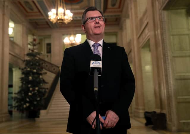 DUP's Jeffrey Donaldson arrives speaks to the media in the Great Hall of Parliament Buildings Stormont as talks aimed at restoring powersharing in Northern Ireland  resumed
