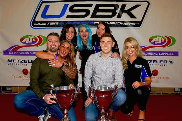 Ulster Superbike champion Carl Phillips and Ulster Supersport champion Jason Lynn with the USBK grid girls at the MCUI Ulster Centre awards night at the La Mon Hotel. Picture: Maurice Montgomery.