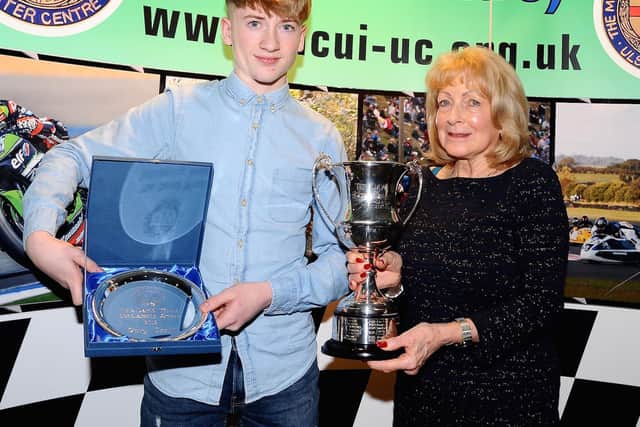 Teenage prospect Gary Scott recieved the David Wood Scholarship and Cup from Lee Wood. Picture: Maurice Montgomery.