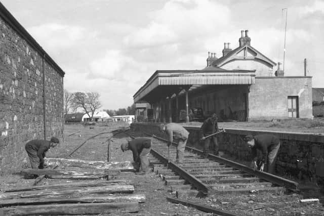 Workmen ripping up the railway line. Picture: Downpatrick & County Down Railway