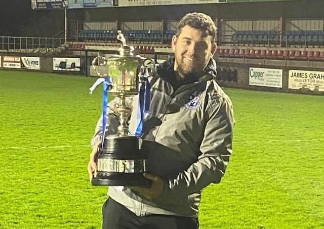 Loughgall boss Dean Smith with the Mid-Ulster Cup. Pic courtesy of Loughgall FC.