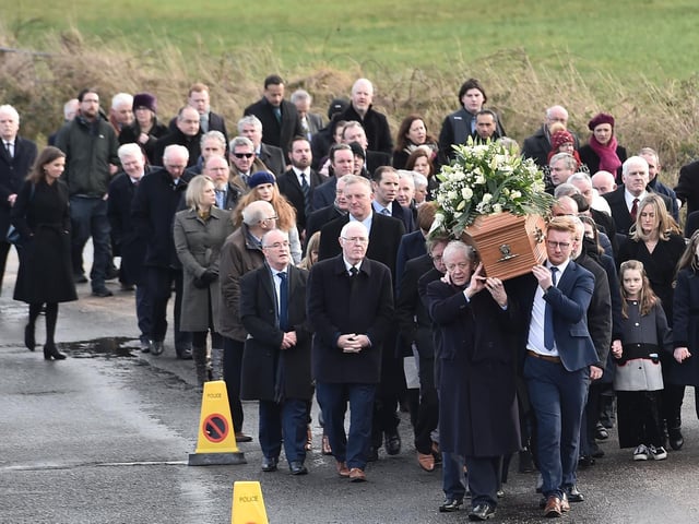 Mourners maker their way to the chapel.