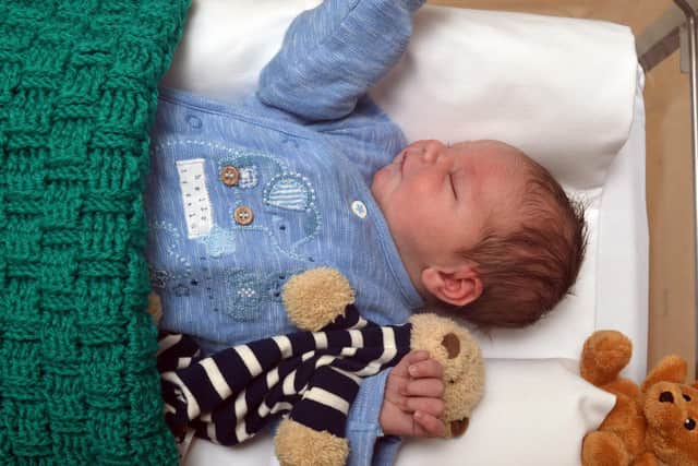 Metropolitan Police undated handout photo of the infant, named Edward, as police are trying to find the mother of the baby boy abandoned on a doorstep in Hackney, east London, shortly before midday on Saturday when he was 12 hours old