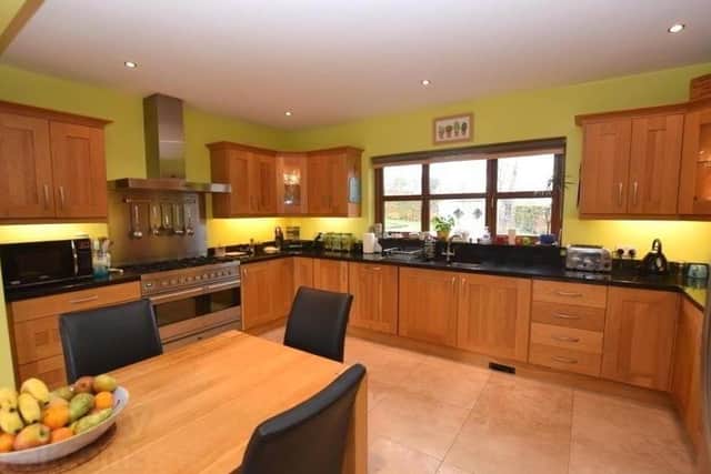 The property has a Kitchen/Dining/Snug