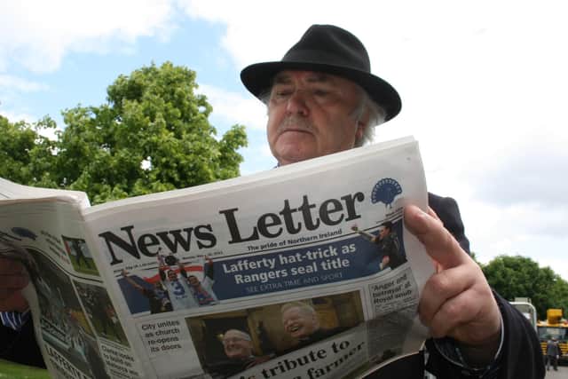 Eoghan Harris reading the News Letter in Dublin in 2011, during the visit of the Queen to Ireland