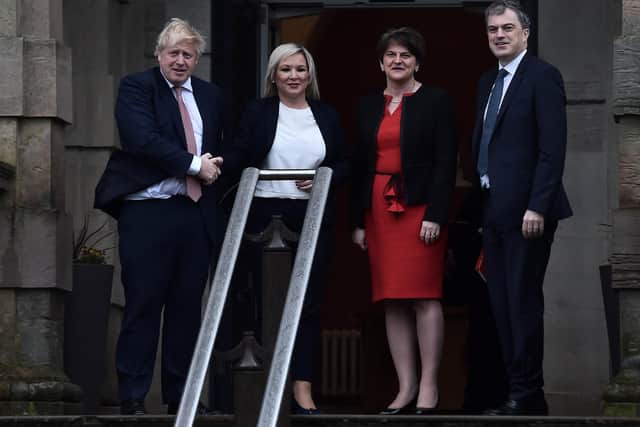 Boris Johnson is greeted by the first and deputy first ministers Arlene Foster and Michelle O'Neill  and NI Secretary Julian Smith at Stormont after the deal to restore devolution in January. "In agreeing to re-enter government with republicans unionists effectively wrote a character reference which every Sinn Fein candidate in the south could produce on every doorstep while canvassing"
