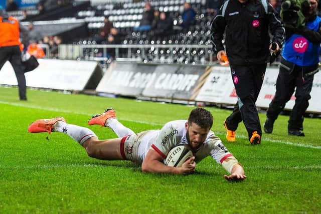 Ulster's Stuart McCloskey goes over for a try against Ospreys during the PRO14 loss in Swansea