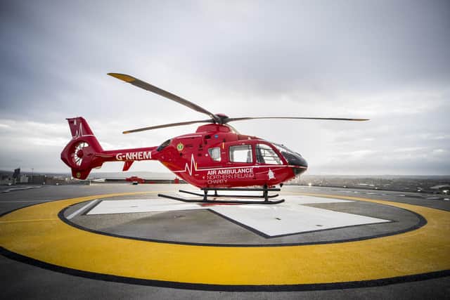 An air ambulance used by the Northern Ireland Helicopter Emergency Medical Service (HEMS) on the helipad at the Royal Victoria Hospital in West Belfast, where the first test landing of an air ambulance took place on Tuesday