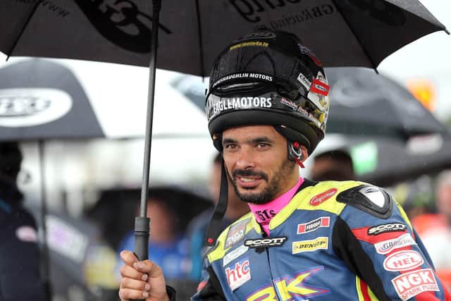 Derek Sheils takes shelter from the rain at the 2019 Ulster Grand Prix. Picture: Stephen Davison/Pacemaker Press.