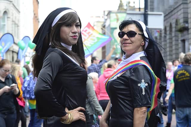 Gay pride marchers in central Belfast, in mock religious garb
